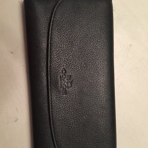 Like new black leather Coach wallet.